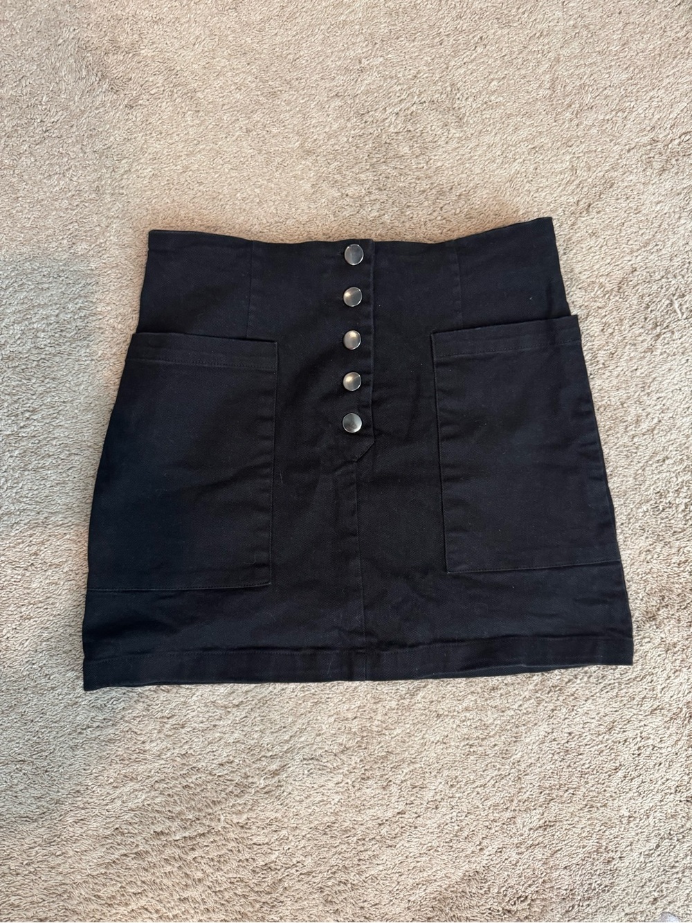 Black denim mini skirt